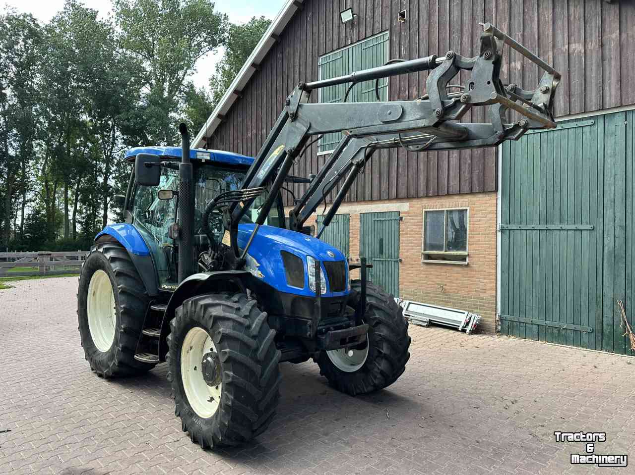 Schlepper / Traktoren New Holland TS100A met voorlader