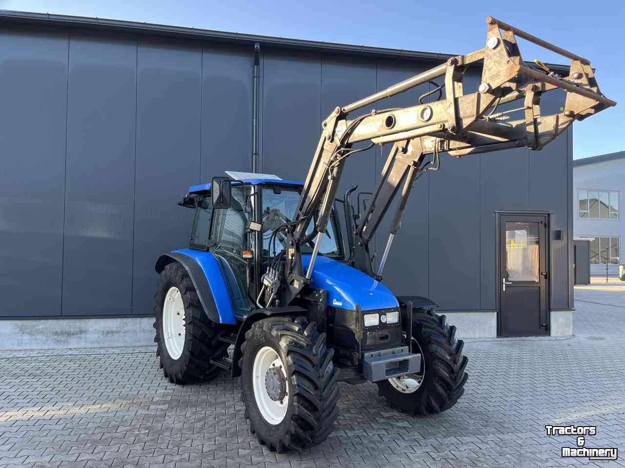 Schlepper / Traktoren New Holland TL90