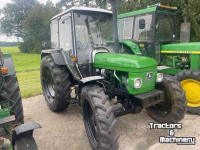 Schlepper / Traktoren John Deere 1950 MC-1 cab.